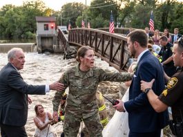 My Father-In-Law Called My Guard Service A Joke While The Whole Family Laughed. Hours Later, A Pedestrian Bridge Failed, Three People Were Injured, And The Bride Vanished Into The River. They Begged Me For Every Urgent Rescue Order. One Rescue Officer Suddenly Stared At Me. “You Were With Task Force Granite? You’re Switchback?” His Radio Crackled: “Lieutenant Colonel Mercer—Identity Confirmed.”