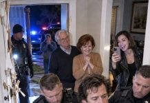 At 1:47 a.m., police kicked down my door and arrested me for estate fraud. My parents stood behind them, smiling, while my sister livestreamed my humiliation to over a million viewers. I didn’t resist. But at the station, one officer opened my file and suddenly froze…
