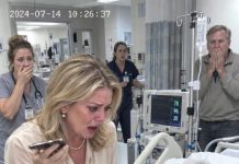 I called my husband 31 times while his mother lay dying in the ER. His mistress finally answered, laughing, “He’s in the shower. We’re on vacation, old wife!” My mother-in-law heard everything. Then she grabbed my wrist, pressed a silver key into my hand, and whispered two terrifying words.