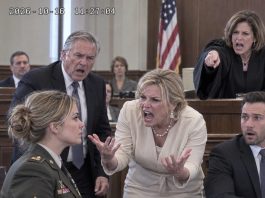 My parents dragged me into court, screaming that I was a fake veteran who had stolen military honors! Their lawyer demanded I be punished for fraud. I stayed silent until the female judge suddenly stood, pulled back her robe, and revealed a scar that left everyone speechless…