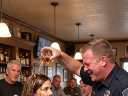 The night before I became police captain, a drunk officer poured bourbon over my head in a crowded bar.