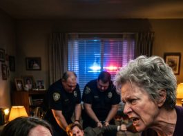My husband threatened to kick me out when I refused to pay his mother, but the police burst in before he could finish.