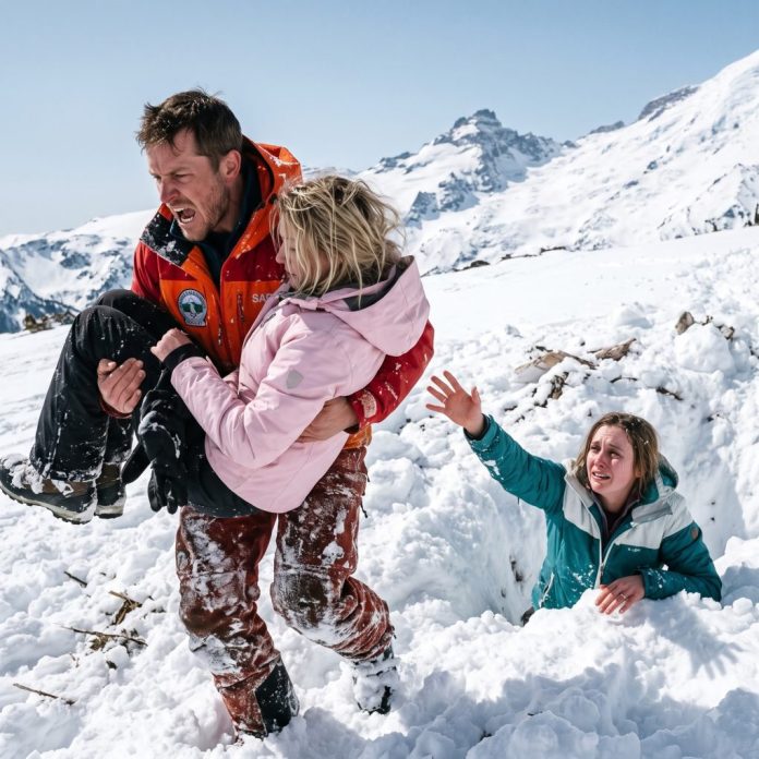 Rescuer_carrying_woman_in_snow_2K_20261010101030