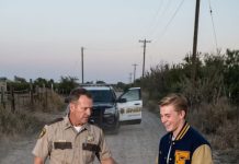 An oil billionaire’s son and his football team dragged my son a mile down a gravel road just for winning Valedictorian. The corrupt sheriff simply handed back their chain, while my brave boy gave his graduation speech from a hospital bed. They looked down on me as a helpless farmhand, unaware of my 17 years as a Green Beret. I quietly followed all of them three miles into the dark woods…