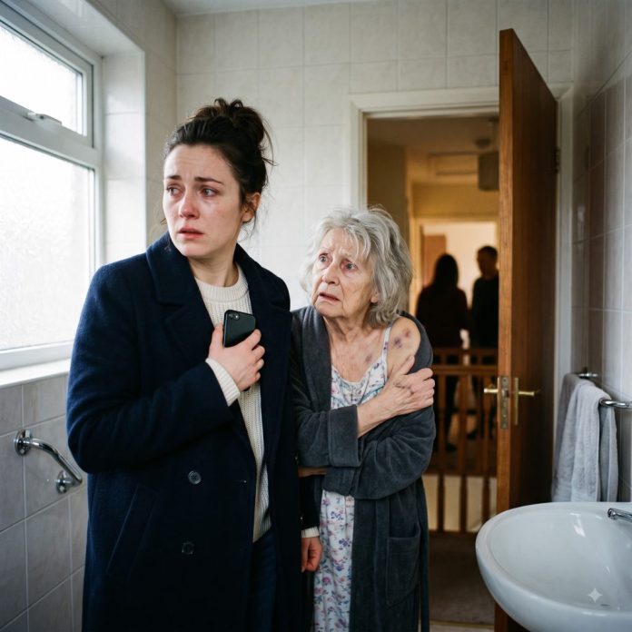 Two_women_sheltering_in_bathroom_2K_20261001085509