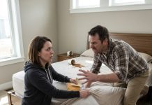 While I was booking our vacation with my husband, I accidentally spilled coffee on the bed. I lifted the mattress to clean it up—and froze when I saw what he had hidden underneath. What I found destroyed everything.