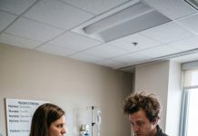 While I was giving birth, my husband spent six days four floors above me in his mistress’s hospital room. When he finally walked down, he stared blankly at the empty bassinet and asked, “Where’s our baby?” With a shattered heart and silent tears, I didn’t say a word. I simply handed him the envelope that changed his life forever.