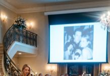 My sister-in-law shoved me down the stairs in front of a hundred anniversary guests. As I cried in pain, my husband told everyone I was being dramatic. Then our wedding slideshow suddenly changed, exposing a conversation neither of them wanted anyone to hear.