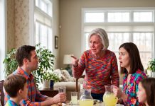 My daughter-in-law poured ice-cold lemonade for everyone at the crowded Sunday dinner table—except me. When I held out my empty glass, she smiled sweetly and whispered, “Oh, that’s only for family.” I set my glass down without saying a word, pulled out my phone, and ruined her life before dessert was served.