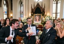 At my mom’s funeral, my stepfather stood up and declared I wasn’t her biological son. Then the lawyer said, “Before I read her letter, you need to hear this recording.” His face turned pale.